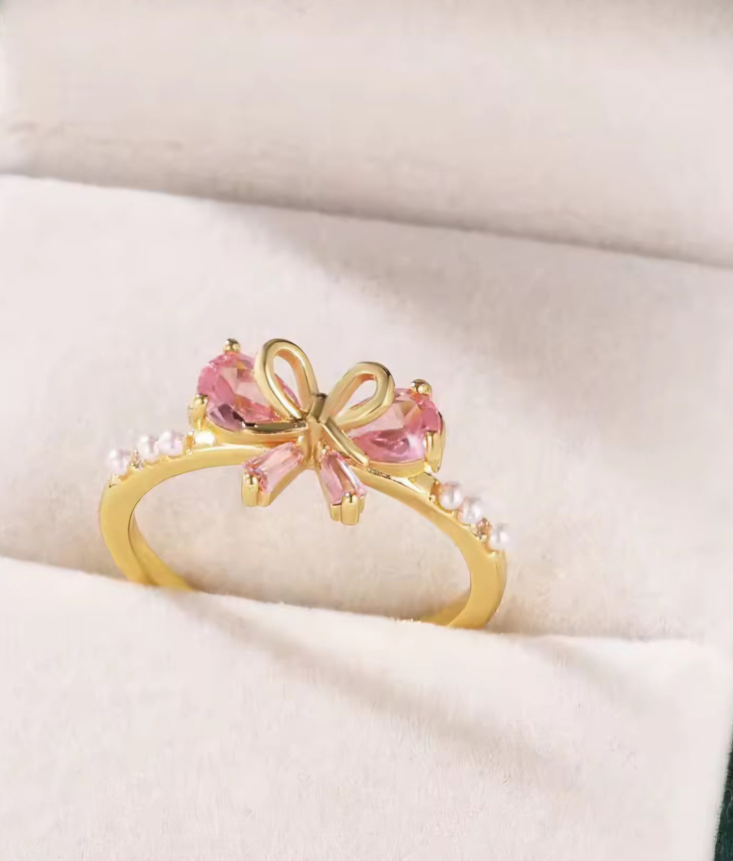 Bow Ring with pearl and pink stone embellishment