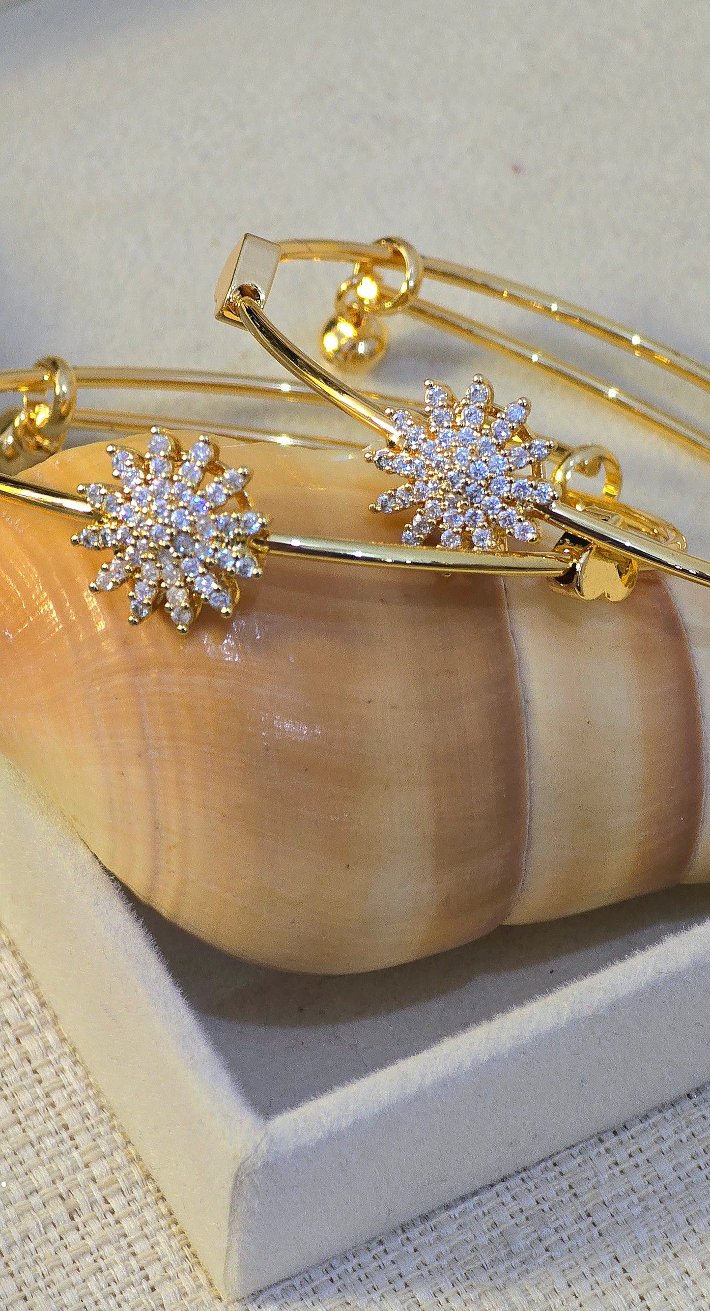 Stack of two floral adjustable handcuffs