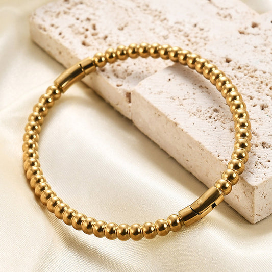 Golden Ball sequence handcuff in stainless steel | Tarnish-Free Gold-Tone Stainless Steel