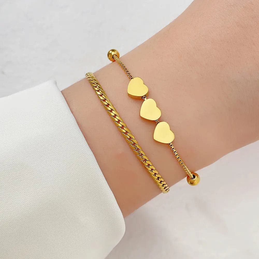 TRIPLE HEART CHARMS BRACELET