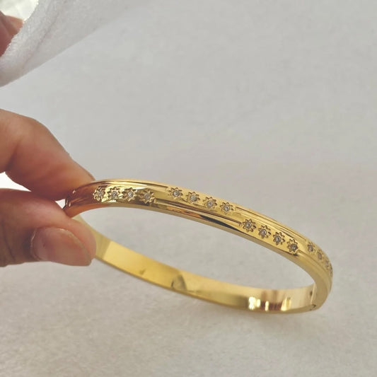 CELESTIAL STAR 18K GOLD PLATED HANDCUFF IN STAINLESS STEEL