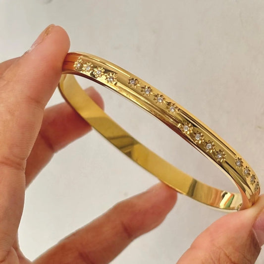 CELESTIAL STAR 18K GOLD PLATED HANDCUFF IN STAINLESS STEEL